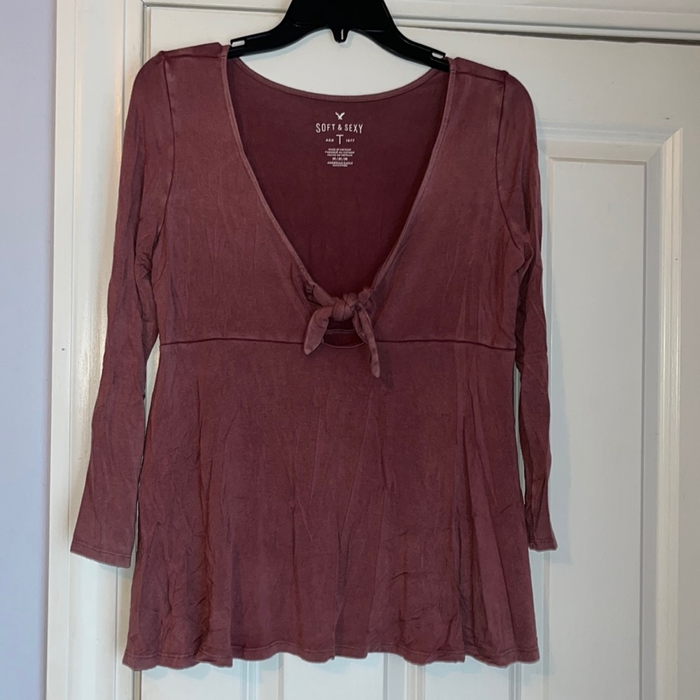 Long sleeve mauve shirt. Size Medium